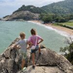 Children enjoying the view over Sai Noi Beach in Hua Hin with kids on a family adventure in Thailand
