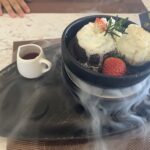 Dessert and coffee at a café in Hua Hin during family worldschooling journey