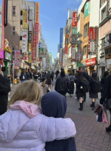 sofia and ally on business streets tokyo